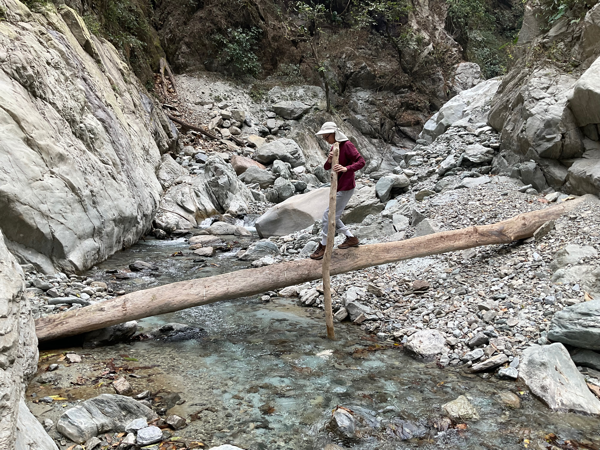 Me crossing a stream